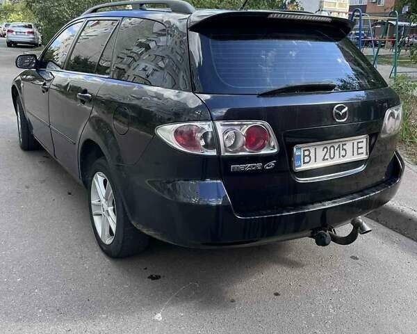 Черный Мазда 6, объемом двигателя 2 л и пробегом 297 тыс. км за 3300 $, фото 1 на Automoto.ua