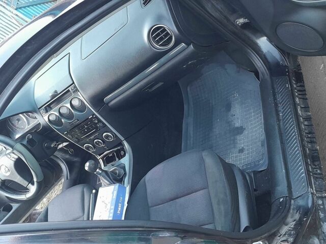 Черный Мазда 6, объемом двигателя 2 л и пробегом 377 тыс. км за 2000 $, фото 1 на Automoto.ua