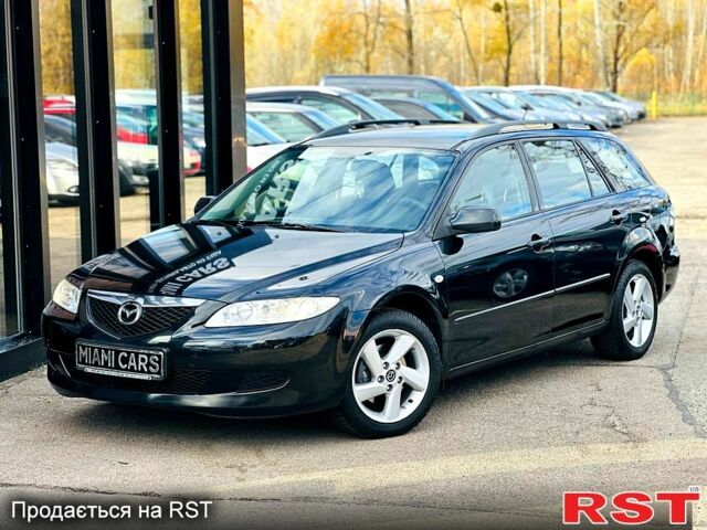 Черный Мазда 6, объемом двигателя 1.8 л и пробегом 299 тыс. км за 3900 $, фото 1 на Automoto.ua