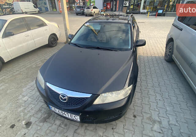 Черный Мазда 6, объемом двигателя 2 л и пробегом 370 тыс. км за 3300 $, фото 1 на Automoto.ua