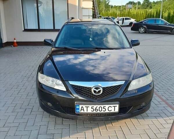 Черный Мазда 6, объемом двигателя 2 л и пробегом 270 тыс. км за 4200 $, фото 1 на Automoto.ua