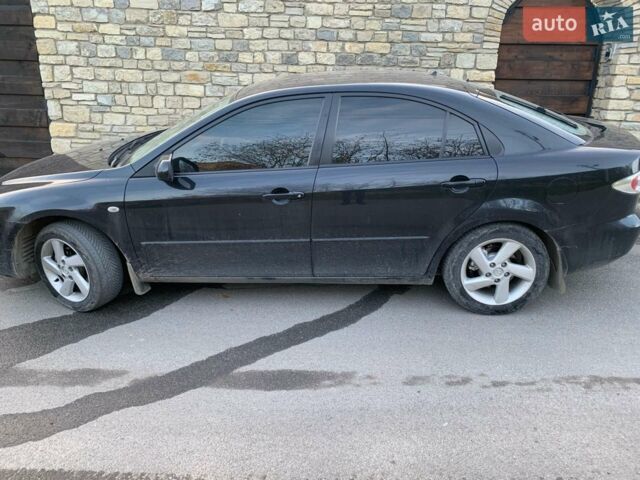 Чорний Мазда 6, об'ємом двигуна 1.8 л та пробігом 272 тис. км за 3800 $, фото 1 на Automoto.ua