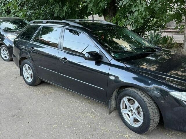 Черный Мазда 6, объемом двигателя 2.3 л и пробегом 400 тыс. км за 2600 $, фото 1 на Automoto.ua