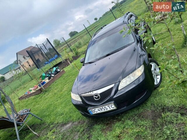 Чорний Мазда 6, об'ємом двигуна 2 л та пробігом 348 тис. км за 4500 $, фото 1 на Automoto.ua