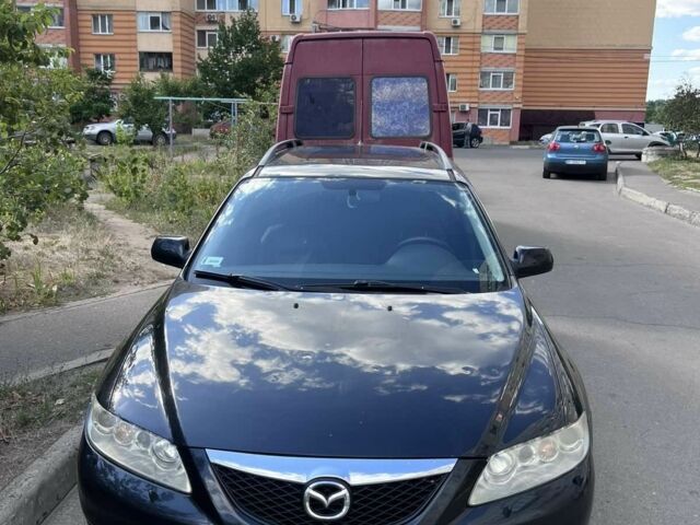 Черный Мазда 6, объемом двигателя 2 л и пробегом 297 тыс. км за 3300 $, фото 1 на Automoto.ua