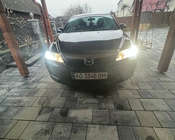 Черный Мазда 6, объемом двигателя 1.8 л и пробегом 173 тыс. км за 4200 $, фото 1 на Automoto.ua