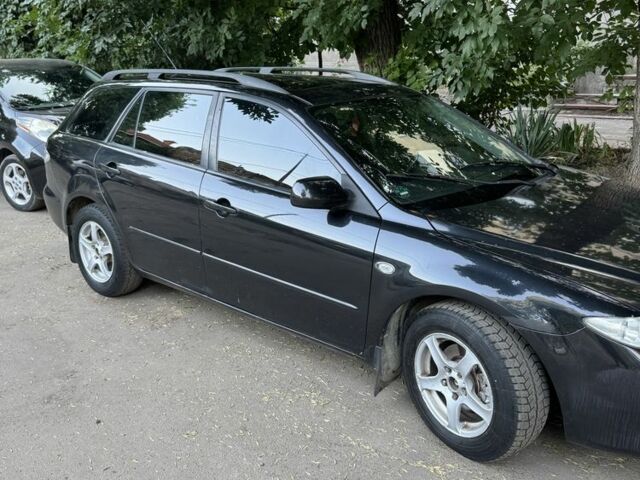 Черный Мазда 6, объемом двигателя 2.3 л и пробегом 370 тыс. км за 2399 $, фото 1 на Automoto.ua