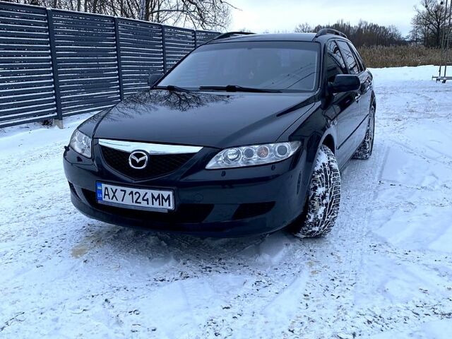 Черный Мазда 6, объемом двигателя 2.3 л и пробегом 290 тыс. км за 4500 $, фото 1 на Automoto.ua