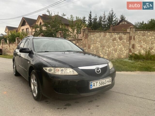 Черный Мазда 6, объемом двигателя 2 л и пробегом 250 тыс. км за 2250 $, фото 1 на Automoto.ua