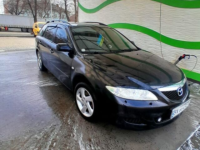 Черный Мазда 6, объемом двигателя 2 л и пробегом 293 тыс. км за 3800 $, фото 1 на Automoto.ua