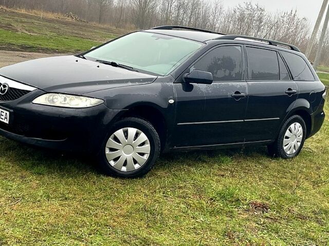Черный Мазда 6, объемом двигателя 2 л и пробегом 280 тыс. км за 4500 $, фото 1 на Automoto.ua