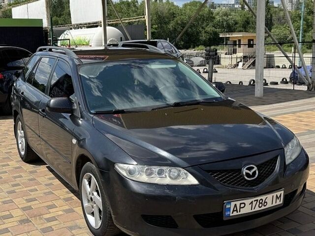 Чорний Мазда 6, об'ємом двигуна 2 л та пробігом 425 тис. км за 2100 $, фото 1 на Automoto.ua
