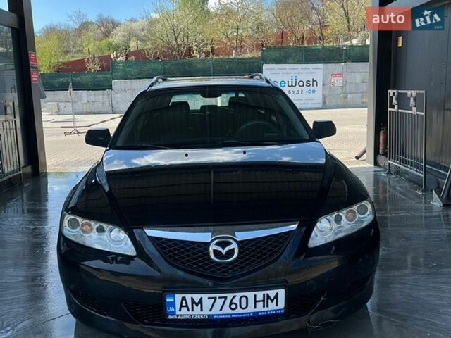 Черный Мазда 6, объемом двигателя 2 л и пробегом 310 тыс. км за 3300 $, фото 1 на Automoto.ua