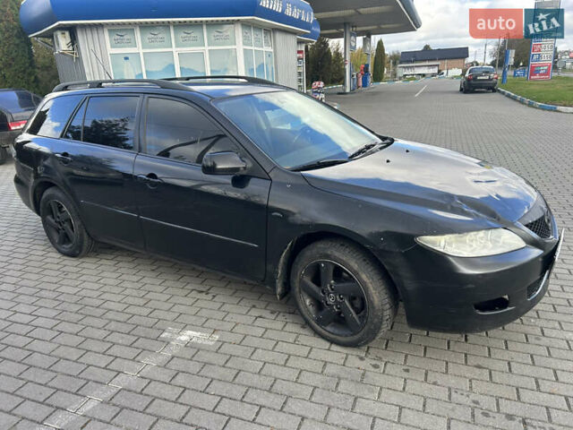 Чорний Мазда 6, об'ємом двигуна 2 л та пробігом 250 тис. км за 2100 $, фото 1 на Automoto.ua