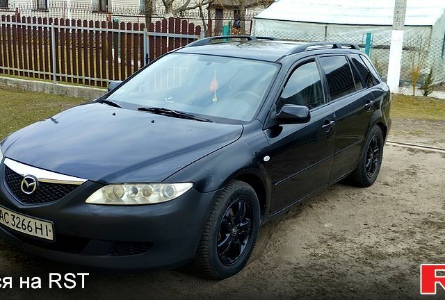 Чорний Мазда 6, об'ємом двигуна 2 л та пробігом 390 тис. км за 3300 $, фото 1 на Automoto.ua