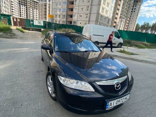 Черный Мазда 6, объемом двигателя 2 л и пробегом 130 тыс. км за 5050 $, фото 1 на Automoto.ua