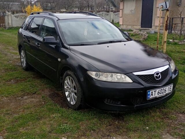 Черный Мазда 6, объемом двигателя 2 л и пробегом 399 тыс. км за 3200 $, фото 1 на Automoto.ua