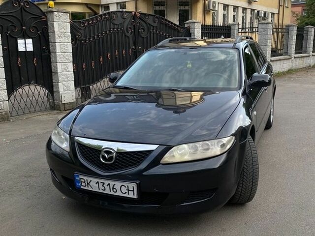 Черный Мазда 6, объемом двигателя 2 л и пробегом 375 тыс. км за 3450 $, фото 1 на Automoto.ua