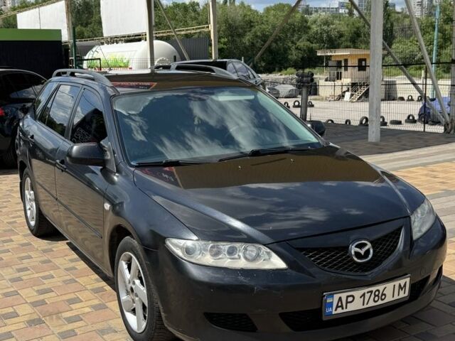Черный Мазда 6, объемом двигателя 2 л и пробегом 300 тыс. км за 2300 $, фото 1 на Automoto.ua