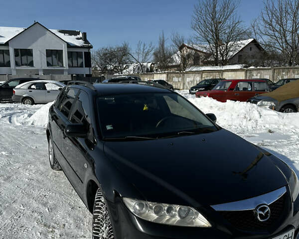 Черный Мазда 6, объемом двигателя 2 л и пробегом 356 тыс. км за 3499 $, фото 1 на Automoto.ua