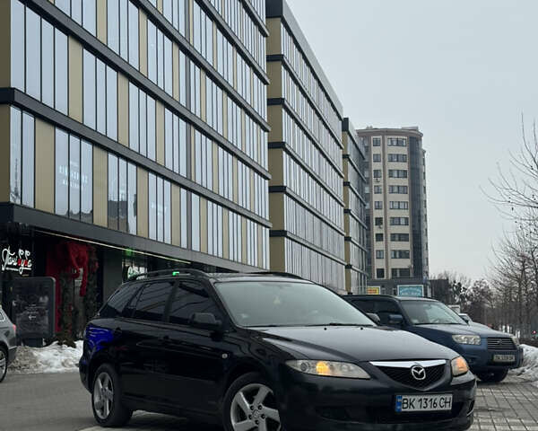 Черный Мазда 6, объемом двигателя 2 л и пробегом 348 тыс. км за 2999 $, фото 1 на Automoto.ua