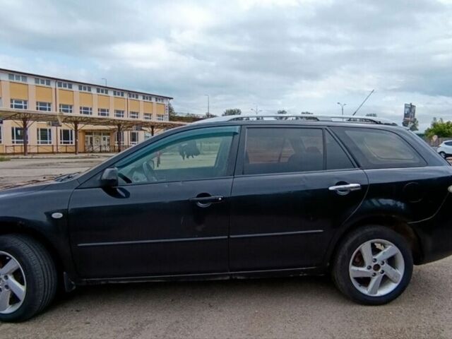 Чорний Мазда 6, об'ємом двигуна 2 л та пробігом 336 тис. км за 3099 $, фото 1 на Automoto.ua