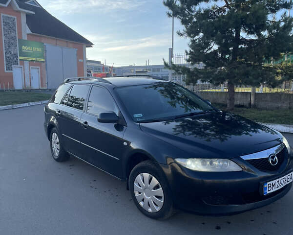 Черный Мазда 6, объемом двигателя 2 л и пробегом 280 тыс. км за 4500 $, фото 1 на Automoto.ua