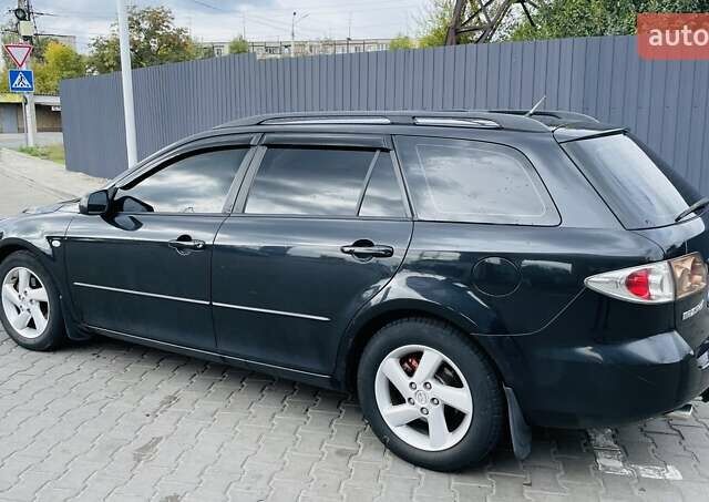 Чорний Мазда 6, об'ємом двигуна 2 л та пробігом 325 тис. км за 5500 $, фото 1 на Automoto.ua