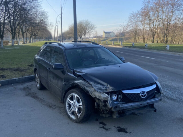 Черный Мазда 6, объемом двигателя 2 л и пробегом 250 тыс. км за 2000 $, фото 1 на Automoto.ua