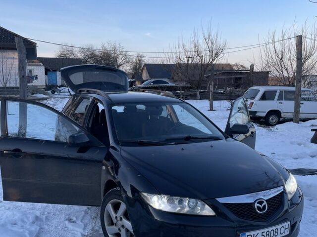 Черный Мазда 6, объемом двигателя 2 л и пробегом 390 тыс. км за 3450 $, фото 1 на Automoto.ua