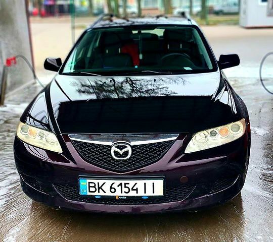 Черный Мазда 6, объемом двигателя 2 л и пробегом 260 тыс. км за 4400 $, фото 1 на Automoto.ua