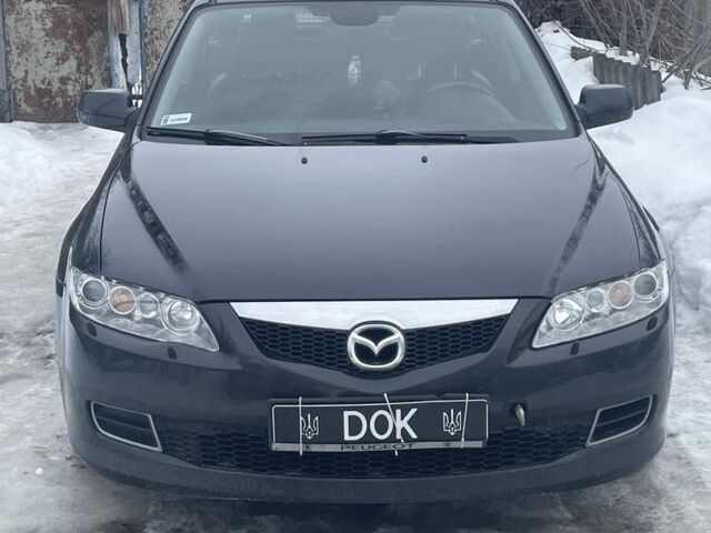 Черный Мазда 6, объемом двигателя 2 л и пробегом 380 тыс. км за 3100 $, фото 1 на Automoto.ua