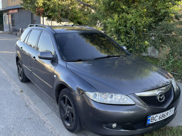 Черный Мазда 6, объемом двигателя 2 л и пробегом 280 тыс. км за 3500 $, фото 1 на Automoto.ua