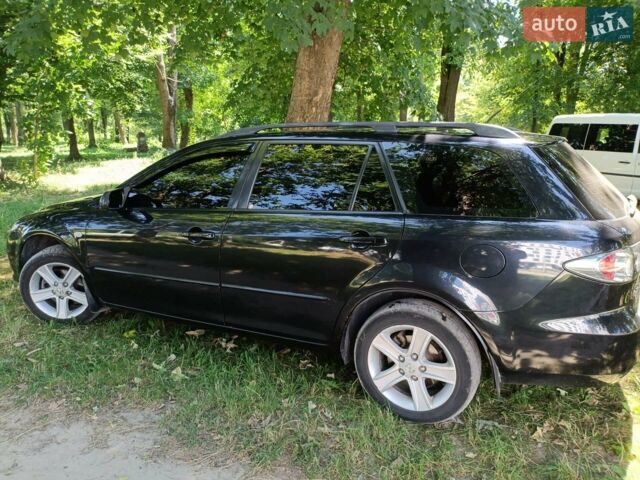 Черный Мазда 6, объемом двигателя 2 л и пробегом 440 тыс. км за 5000 $, фото 1 на Automoto.ua