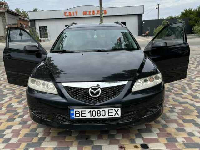 Чорний Мазда 6, об'ємом двигуна 2 л та пробігом 308 тис. км за 5602 $, фото 1 на Automoto.ua