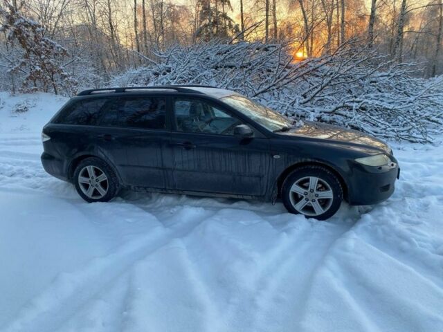 Черный Мазда 6, объемом двигателя 2 л и пробегом 236 тыс. км за 1700 $, фото 1 на Automoto.ua