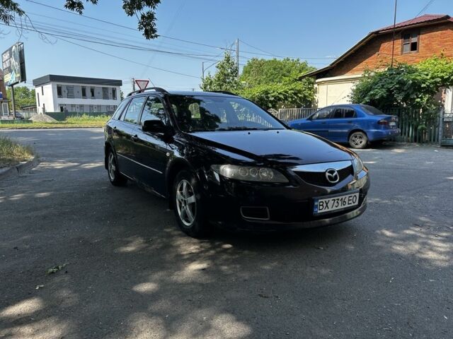 Черный Мазда 6, объемом двигателя 2 л и пробегом 300 тыс. км за 1700 $, фото 1 на Automoto.ua