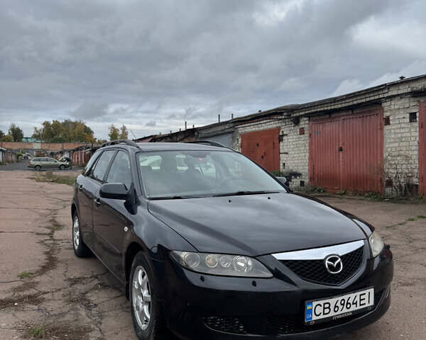 Черный Мазда 6, объемом двигателя 2 л и пробегом 309 тыс. км за 3700 $, фото 1 на Automoto.ua