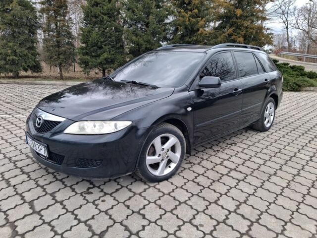 Черный Мазда 6, объемом двигателя 2 л и пробегом 200 тыс. км за 2600 $, фото 1 на Automoto.ua