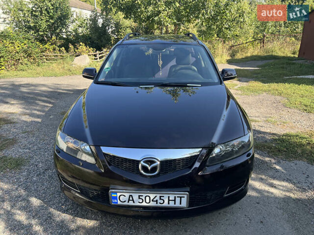 Черный Мазда 6, объемом двигателя 2 л и пробегом 220 тыс. км за 4900 $, фото 1 на Automoto.ua