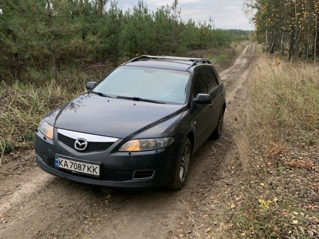 Черный Мазда 6, объемом двигателя 2.3 л и пробегом 300 тыс. км за 6000 $, фото 1 на Automoto.ua
