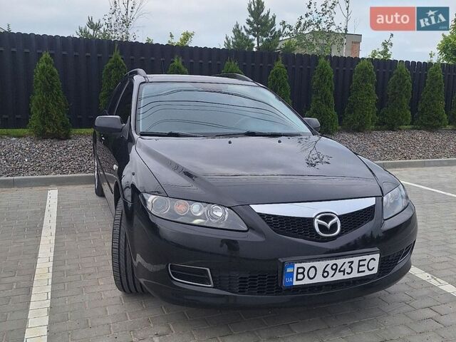 Черный Мазда 6, объемом двигателя 2 л и пробегом 233 тыс. км за 3600 $, фото 1 на Automoto.ua