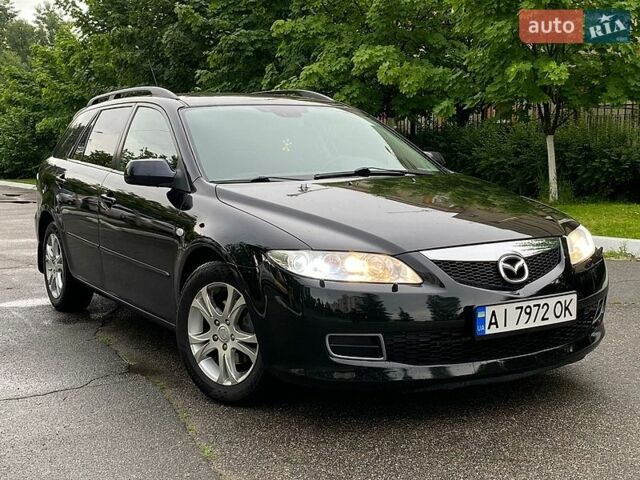 Черный Мазда 6, объемом двигателя 2 л и пробегом 262 тыс. км за 5200 $, фото 1 на Automoto.ua