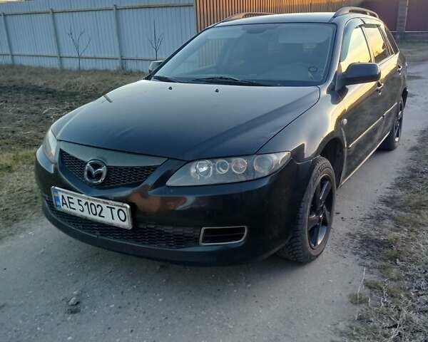 Черный Мазда 6, объемом двигателя 2 л и пробегом 298 тыс. км за 4300 $, фото 1 на Automoto.ua