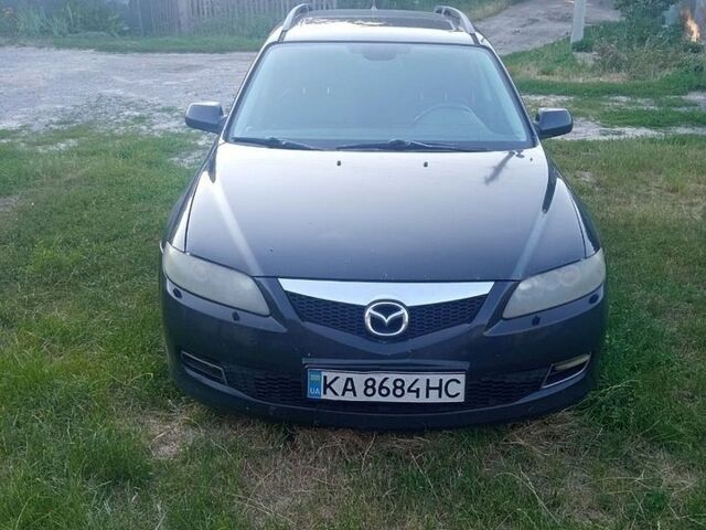 Черный Мазда 6, объемом двигателя 2 л и пробегом 340 тыс. км за 2900 $, фото 1 на Automoto.ua