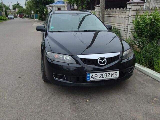 Черный Мазда 6, объемом двигателя 1.8 л и пробегом 240 тыс. км за 3900 $, фото 1 на Automoto.ua