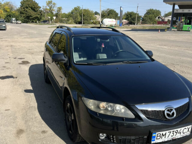 Черный Мазда 6, объемом двигателя 2 л и пробегом 230 тыс. км за 7200 $, фото 1 на Automoto.ua