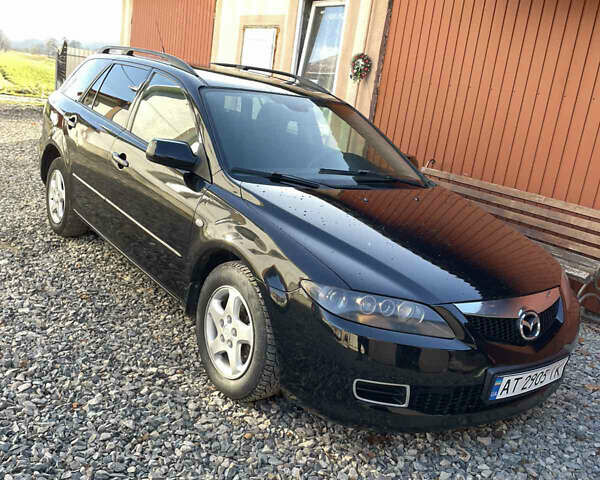 Черный Мазда 6, объемом двигателя 2 л и пробегом 271 тыс. км за 4900 $, фото 1 на Automoto.ua