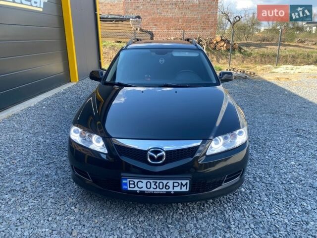 Черный Мазда 6, объемом двигателя 2 л и пробегом 258 тыс. км за 5400 $, фото 1 на Automoto.ua