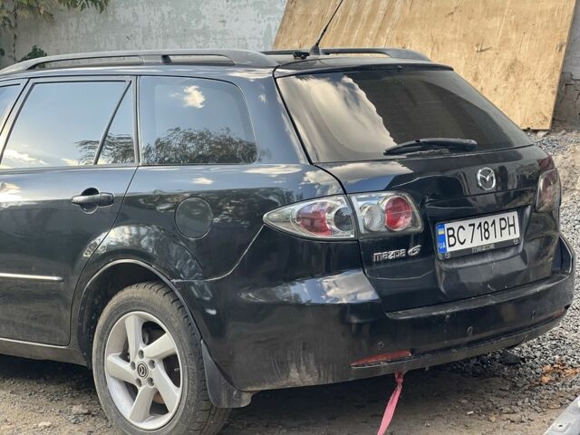 Чорний Мазда 6, об'ємом двигуна 2 л та пробігом 250 тис. км за 653 $, фото 1 на Automoto.ua